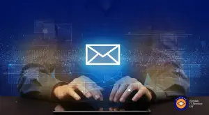 Secure business email and IT services concept: hands typing with envelope icon and digital network overlay Elmdale IT