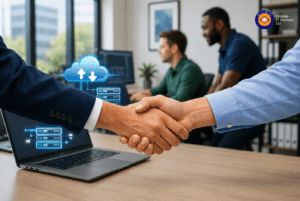 Business handshake over laptop with cloud computing icons, team collaborating on managed IT services and data migration.